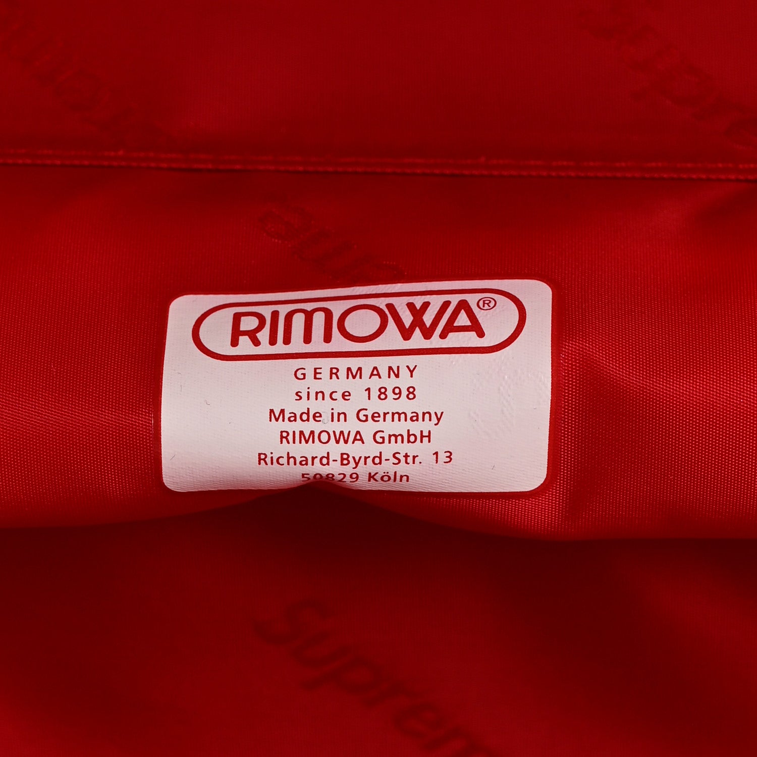 X SUPREME Matte Polycarbonate Topas Multiwheel 82L Red — view 5
