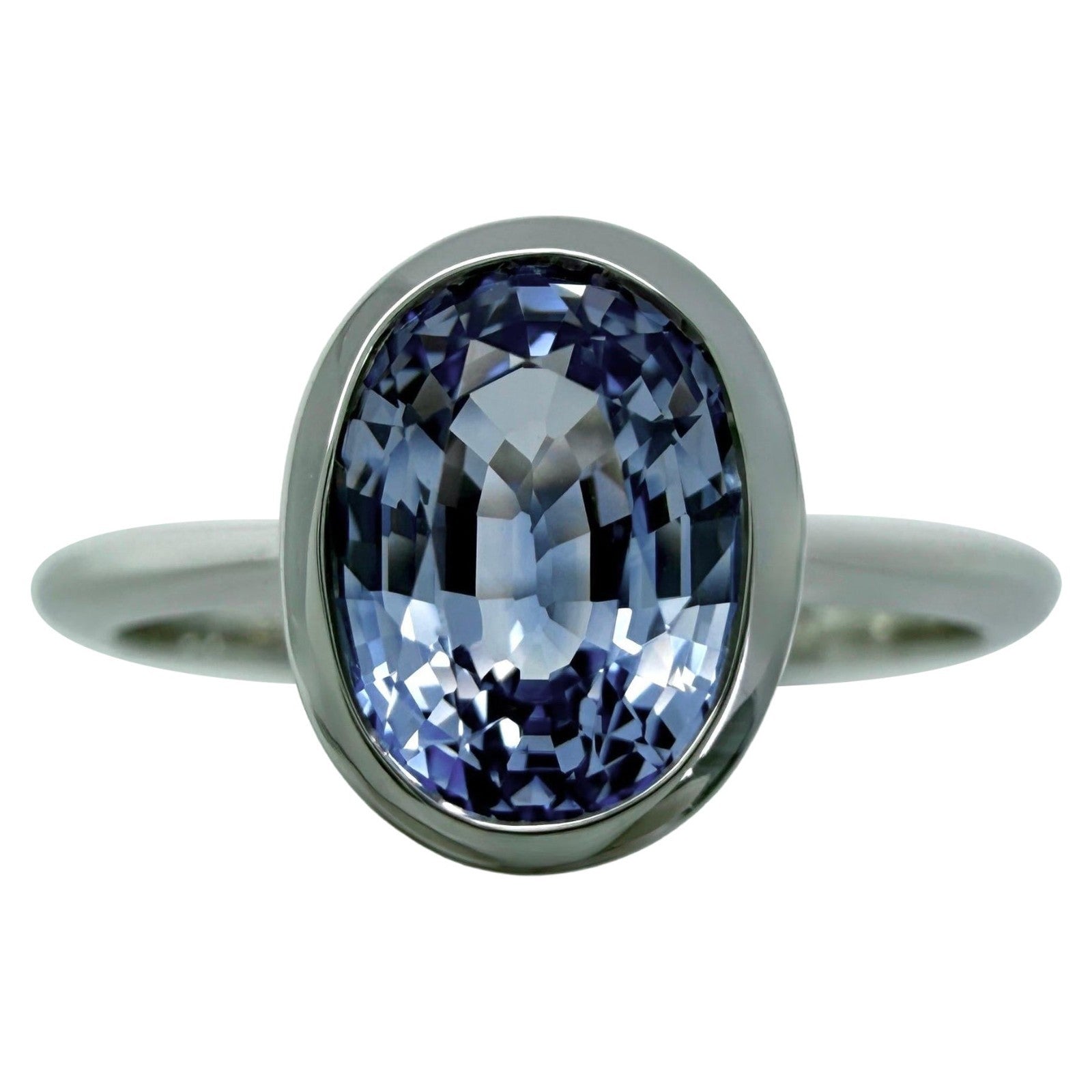 1.03ct Vivid Light Blue Ceylon Sapphire Oval 950 Platinum Solitaire Bezel Ring