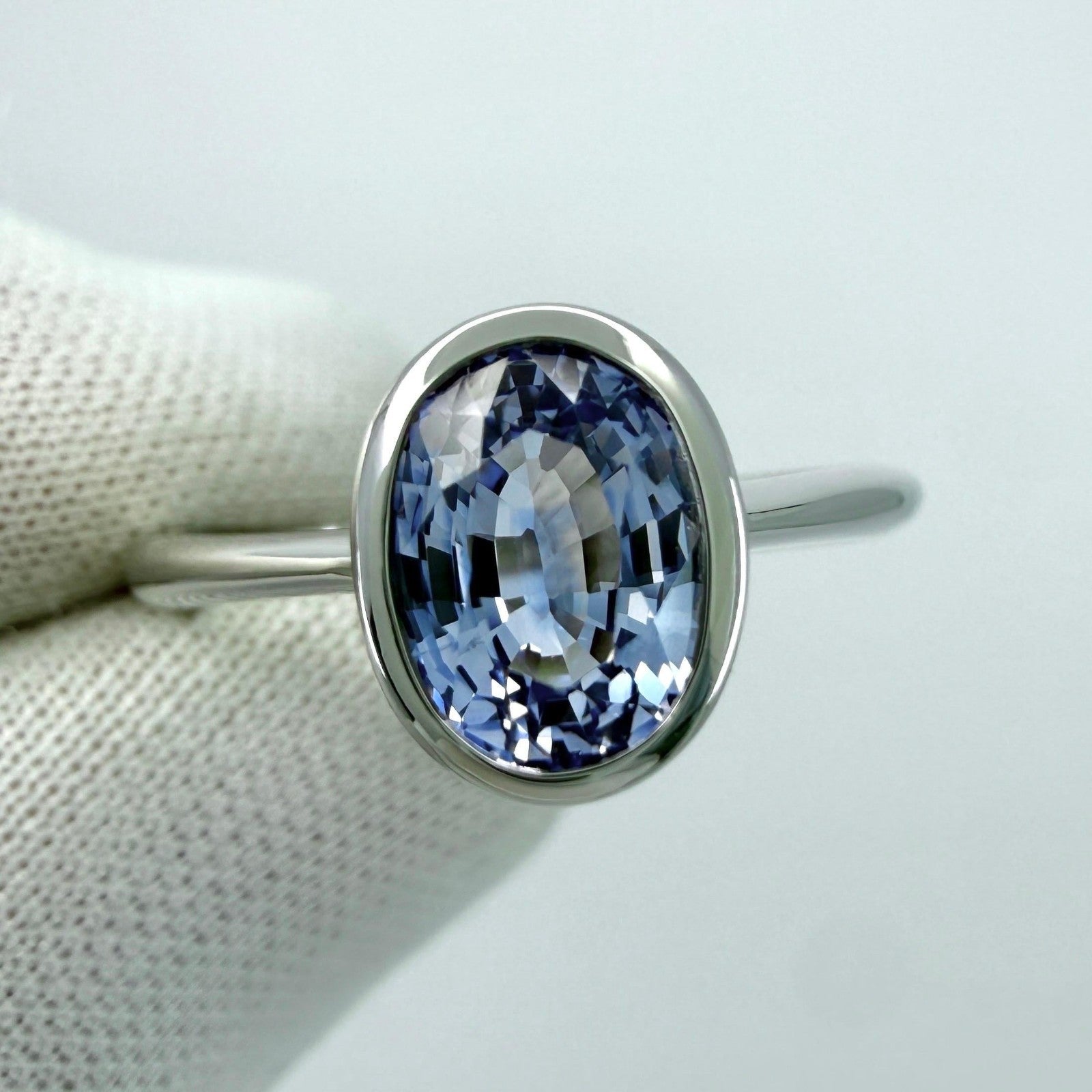1.03ct Vivid Light Blue Ceylon Sapphire Oval 950 Platinum Solitaire Bezel Ring — view 4