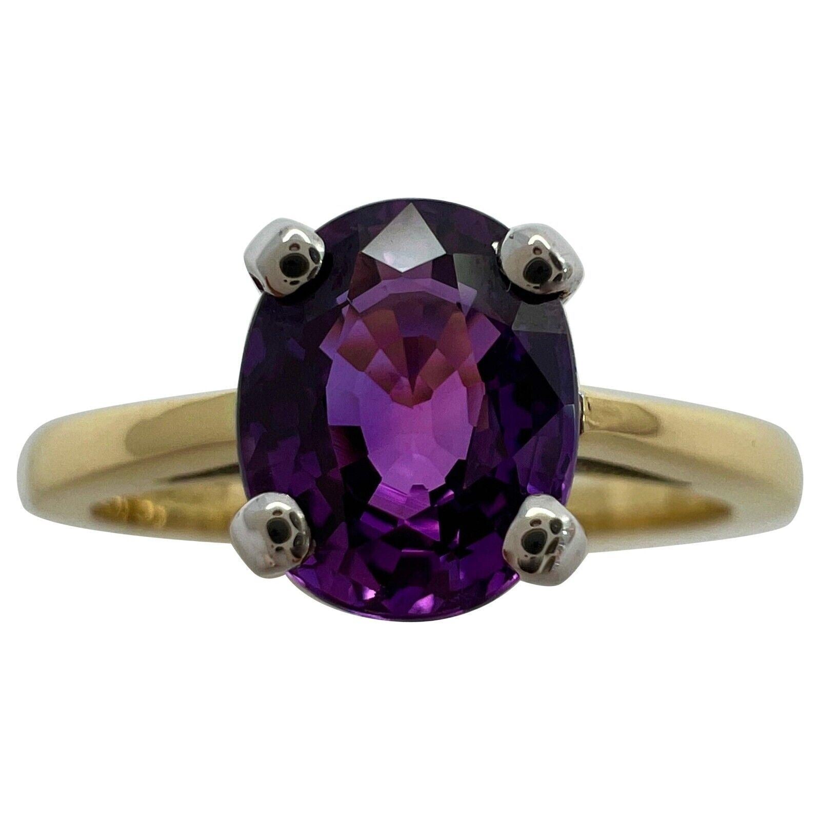 1.59 Carat Natural Deep Purple Sapphire Oval Cut 18 Karat Gold Solitaire Ring — view 1