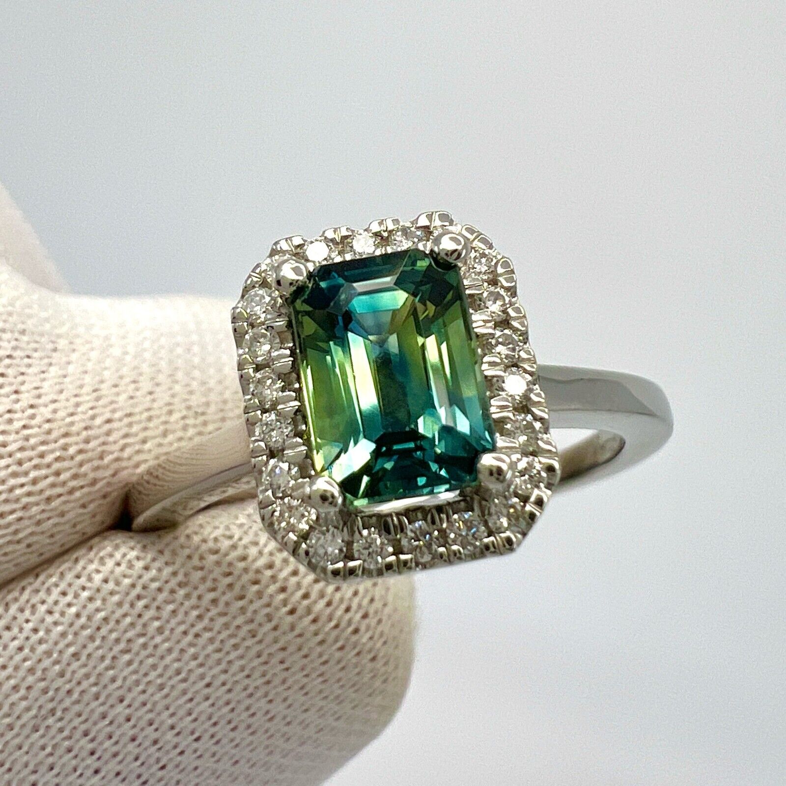 1.50ct GIA Parti Colour Emerald Cut Sapphire And Diamond Platinum Halo Ring — view 4